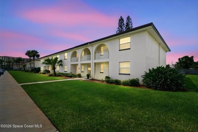 Live within walking distance to a pristine beach in this - photo 3