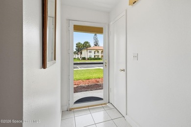 Live within walking distance to a pristine beach in this - photo 4