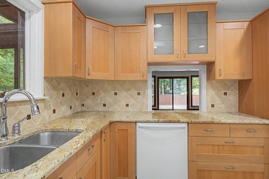 Tucked away on a sprawling corner lot of over 1/2 an acre in the - photo 4