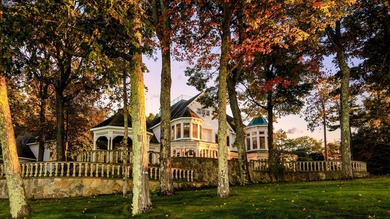 As soon as the gate opens, the quarter-mile driveway leads you - photo 15