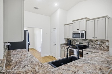 Welcome to this beautifully maintained Adams-built brick home - photo 33