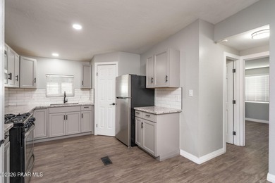 Beautifully refreshed home featuring granite countertops and new