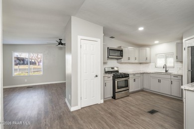 Beautifully refreshed home featuring granite countertops and new