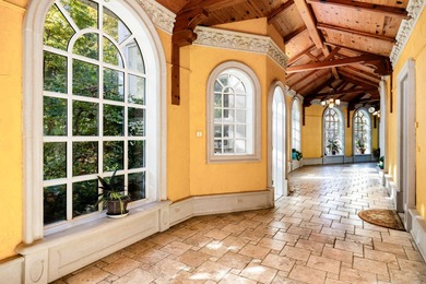 As soon as the gate opens, the quarter-mile driveway leads you - photo 52