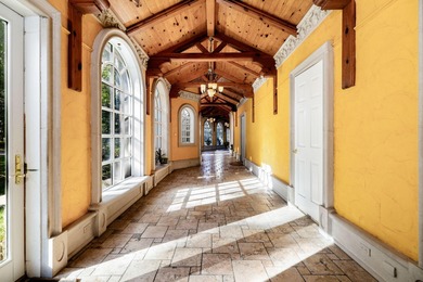 As soon as the gate opens, the quarter-mile driveway leads you - photo 53
