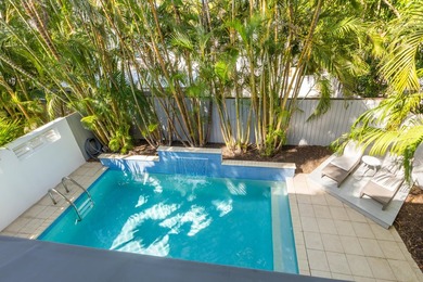 Located in a charming midtown neighborhood sits this beautifully - photo 14