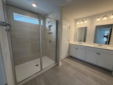 Here is one of the last brand new 3BR 2.5BA homes in the gated - photo 15