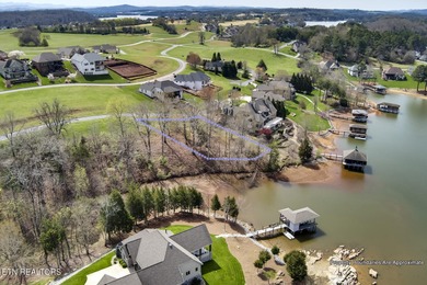 ONE OF THE LAST AVAILABLE gently-sloped LAKEFRONT LOTS left in