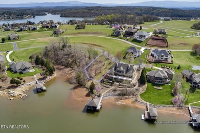 ONE OF THE LAST AVAILABLE gently-sloped LAKEFRONT LOTS left in