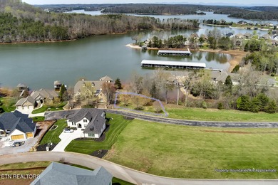 ONE OF THE LAST AVAILABLE gently-sloped LAKEFRONT LOTS left in