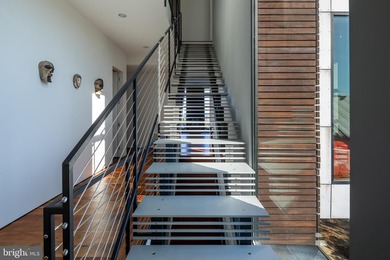 A singular achievement in modern coastal architecture, this - photo 20