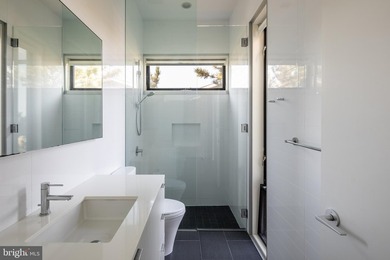 A singular achievement in modern coastal architecture, this - photo 22