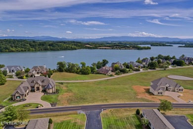 ONE OF THE LAST AVAILABLE gently-sloped LAKEFRONT LOTS left in