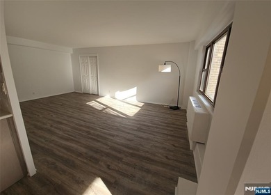 Live in it or rent it out. Sun-filled, all utilities included