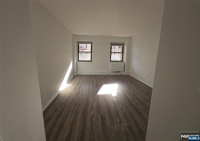 Live in it or rent it out. Sun-filled, all utilities included