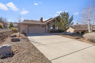 Situated in the highly sought-after Prescott Lakes community