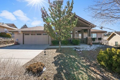 Situated in the highly sought-after Prescott Lakes community