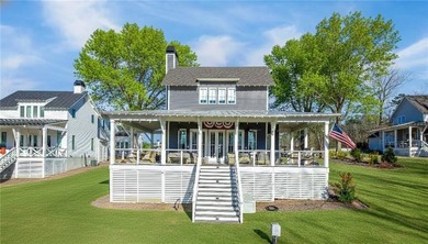 Experience refined lake living at this beautifully designed - photo 2