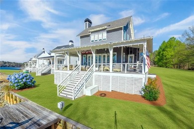 Experience refined lake living at this beautifully designed - photo 3