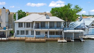 Positioned on 100 feet of prime open waterfront along the shores - photo 1
