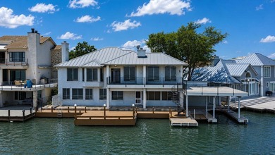 Positioned on 100 feet of prime open waterfront along the shores - photo 2