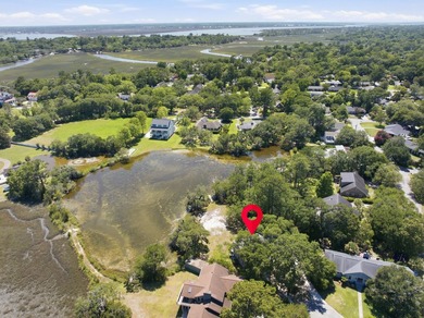Tucked beneath a canopy of magnificent live oaks in Charleston's - photo 26