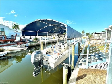 PARADISE AWAITS! Canal front home Gulf access 15 minutes to the