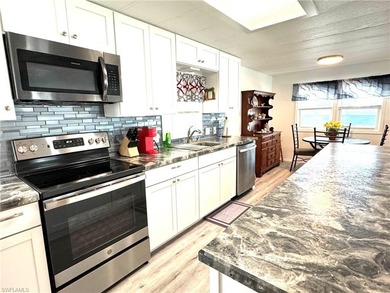 PARADISE AWAITS! Canal front home Gulf access 15 minutes to the