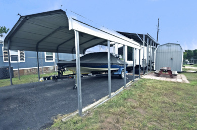 Lot in Gated Waterfront Community on Lake Fork, RV, carport, shed - photo 8