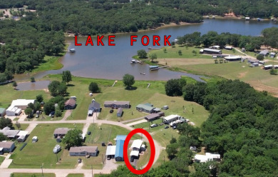 Lot in Gated Waterfront Community on Lake Fork, RV, carport, shed - photo 2