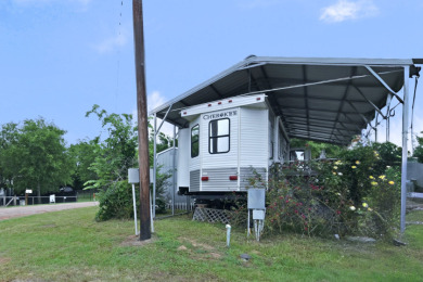 Lot in Gated Waterfront Community on Lake Fork, RV, carport, shed - photo 6