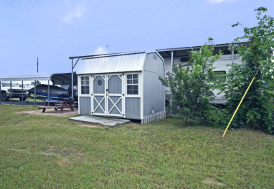 Lot in Gated Waterfront Community on Lake Fork, RV, carport, shed - photo 5
