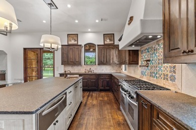 Tucked away in the exclusive Escondido Golf & Lake Club, this - photo 14