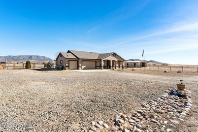 This is the perfect combination of a beautiful custom home AND