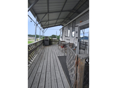 Lot in Gated Waterfront Community on Lake Fork, RV, carport, shed - photo 10