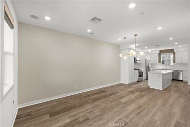 Experience the beauty of this former model home located in the - photo 12