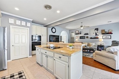 Welcome to this charming patio home nestled within the gated