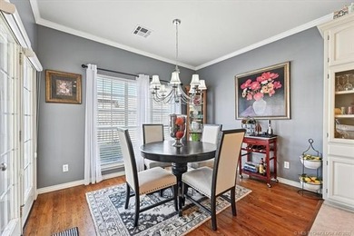 Welcome to this charming patio home nestled within the gated