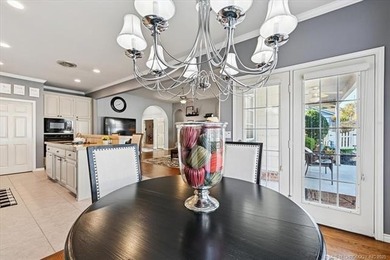 Welcome to this charming patio home nestled within the gated