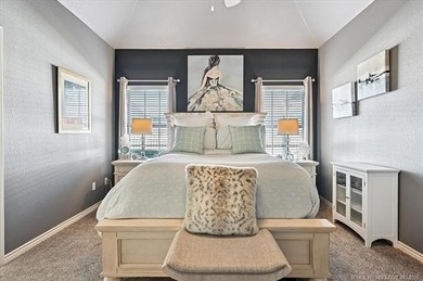 Welcome to this charming patio home nestled within the gated