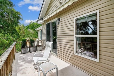 Nestled beneath a canopy of moss-draped grand oaks, where the - photo 26