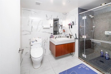 Spacious and sun-filled high-floor 2-bedroom, 2-bath apartment - photo 15