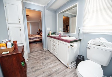This 3 bedroom, 2 bath manufactured home is on a level .60 acre - photo 16
