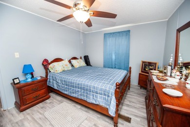 This 3 bedroom, 2 bath manufactured home is on a level .60 acre - photo 20