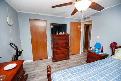 This 3 bedroom, 2 bath manufactured home is on a level .60 acre - photo 21