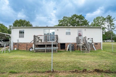 This 3 bedroom, 2 bath manufactured home is on a level .60 acre - photo 22