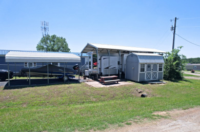 Lot in Gated Waterfront Community on Lake Fork, RV, carport, shed - photo 1