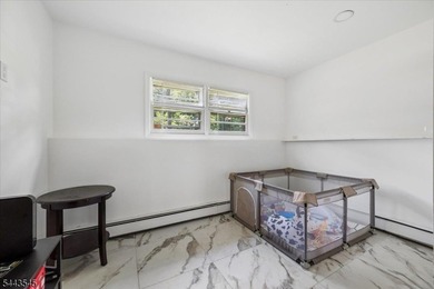 Welcome home to this beautifully maintained 3-bedroom bi-level - photo 27