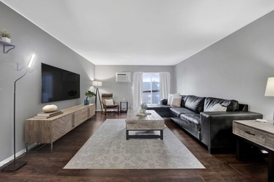 Two bedroom, one and a half bathroom 4th-floor corner unit in