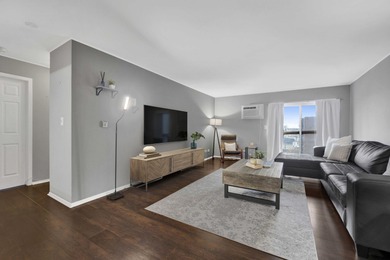 Two bedroom, one and a half bathroom 4th-floor corner unit in